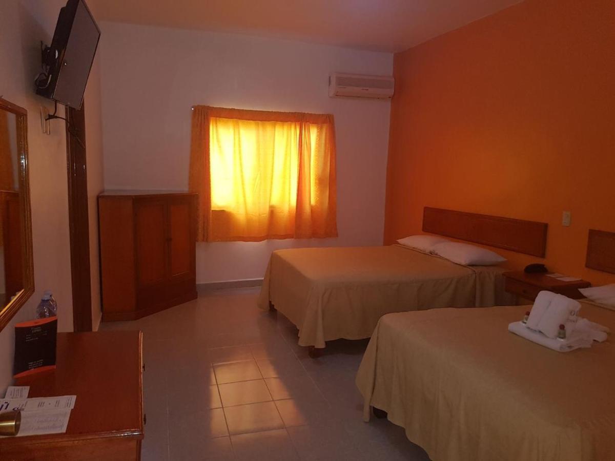 Hotel Arcos Del Parque Acayucan Bagian luar foto